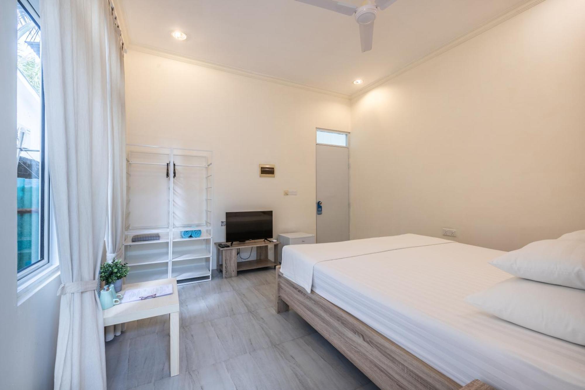 Three Hearts Guesthouse And Villas Fulhadhoo Rum bild